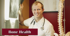 Bone Health Tips. Picture of a caucasian male physical therapist looking at xrays.