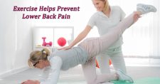 Exercise Helps Prevent Lower Back Pain. Picture of a caucasian female exercising with a caucasian female physical therapist.