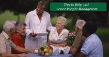 Tips to Help Seniors with Weight Management. Picture of 2 caucasian females, 2 caucasian males and 1 black male sitting at a table discussing something with a caucasian female healthcare giver.