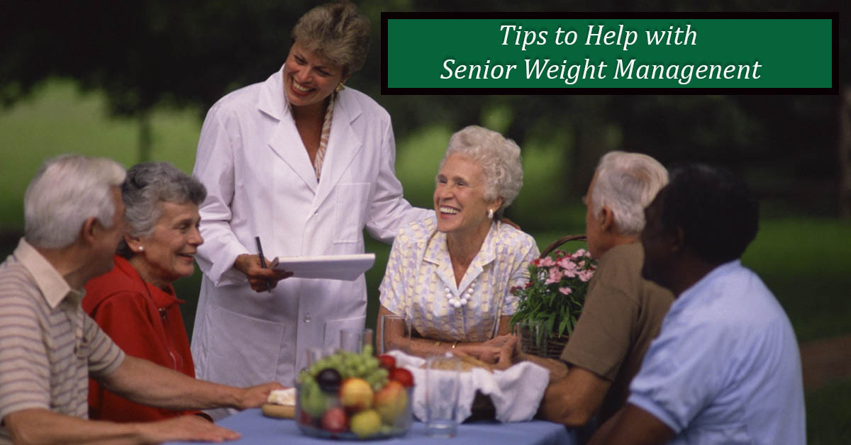 Tips to Help Seniors with Weight Management. Picture of 2 caucasian females, 2 caucasian males and 1 black male sitting at a table discussing something with a caucasian female healthcare giver.